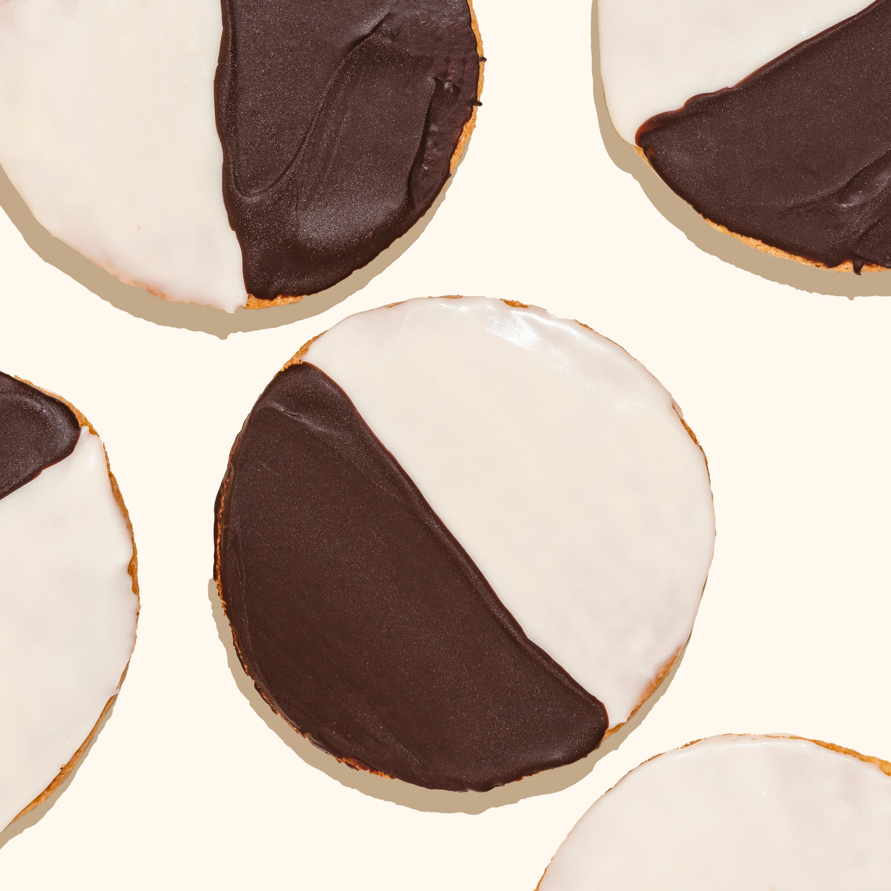 overhead shot of black & white iced cookies