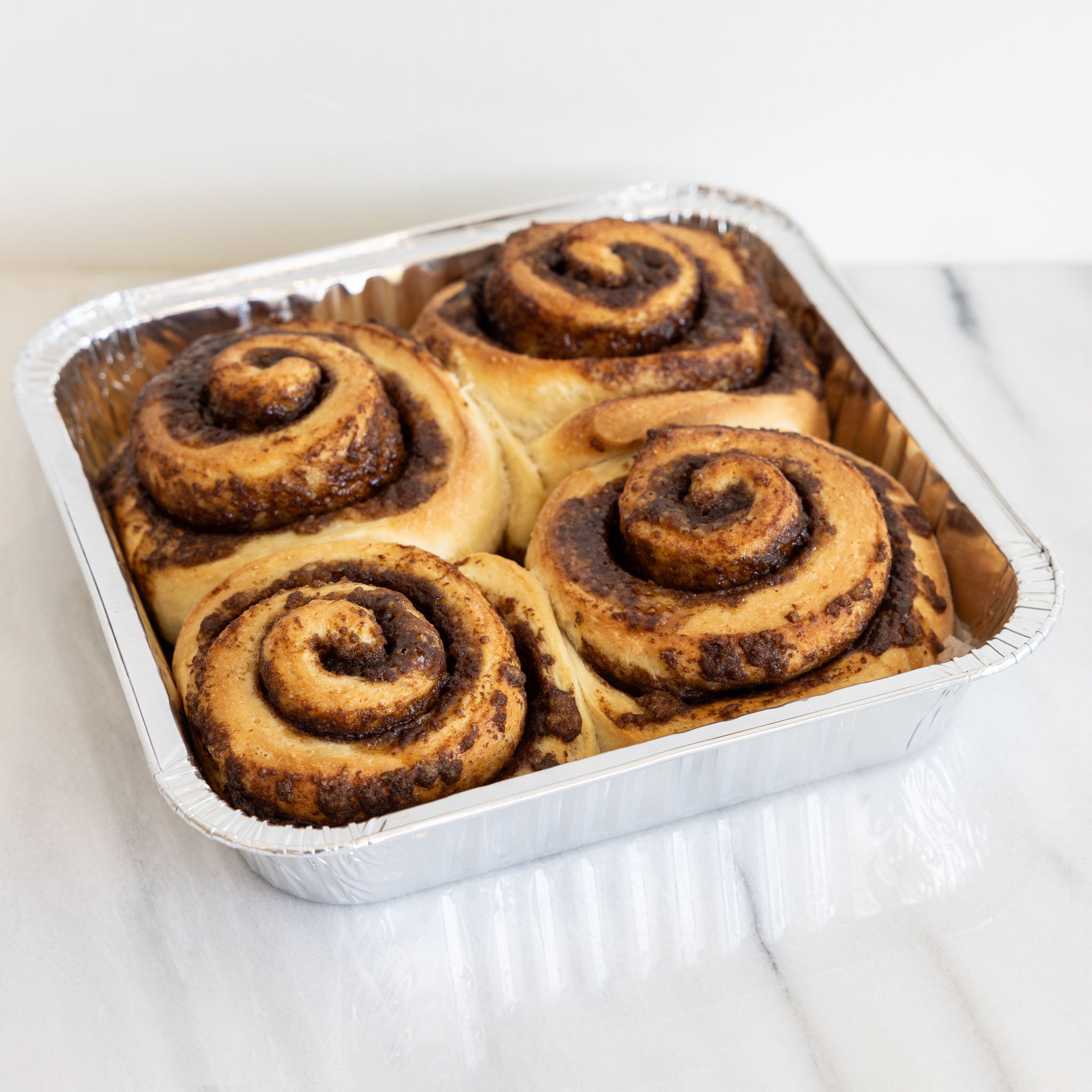 baked unfrosted cinnamon roll 4-pack